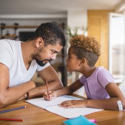 Father and daughter fighting over homework