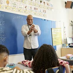 Math teacher in front of class