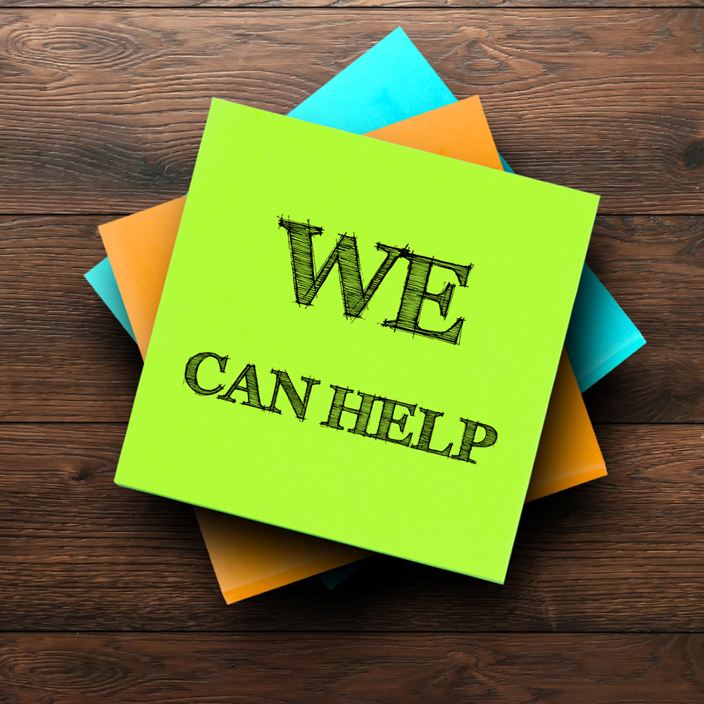 Sticky note that says "We Can Help"
