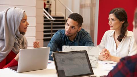 Four teachers meeting together